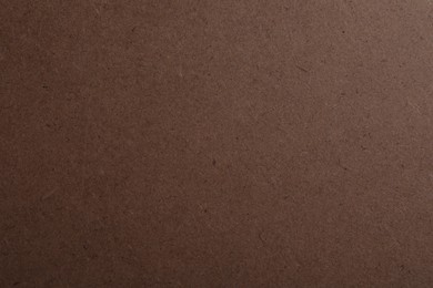 Photo of Texture of kraft paper bag as background, closeup