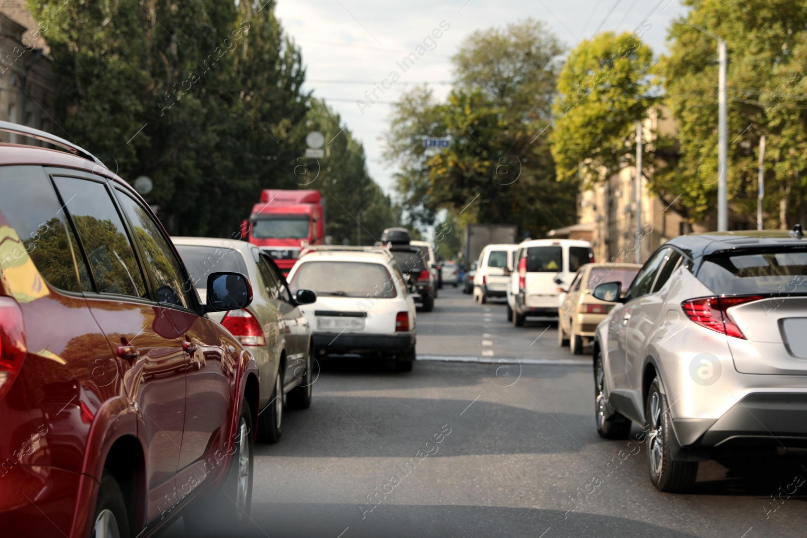 Photo of Cars in traffic jam on city street