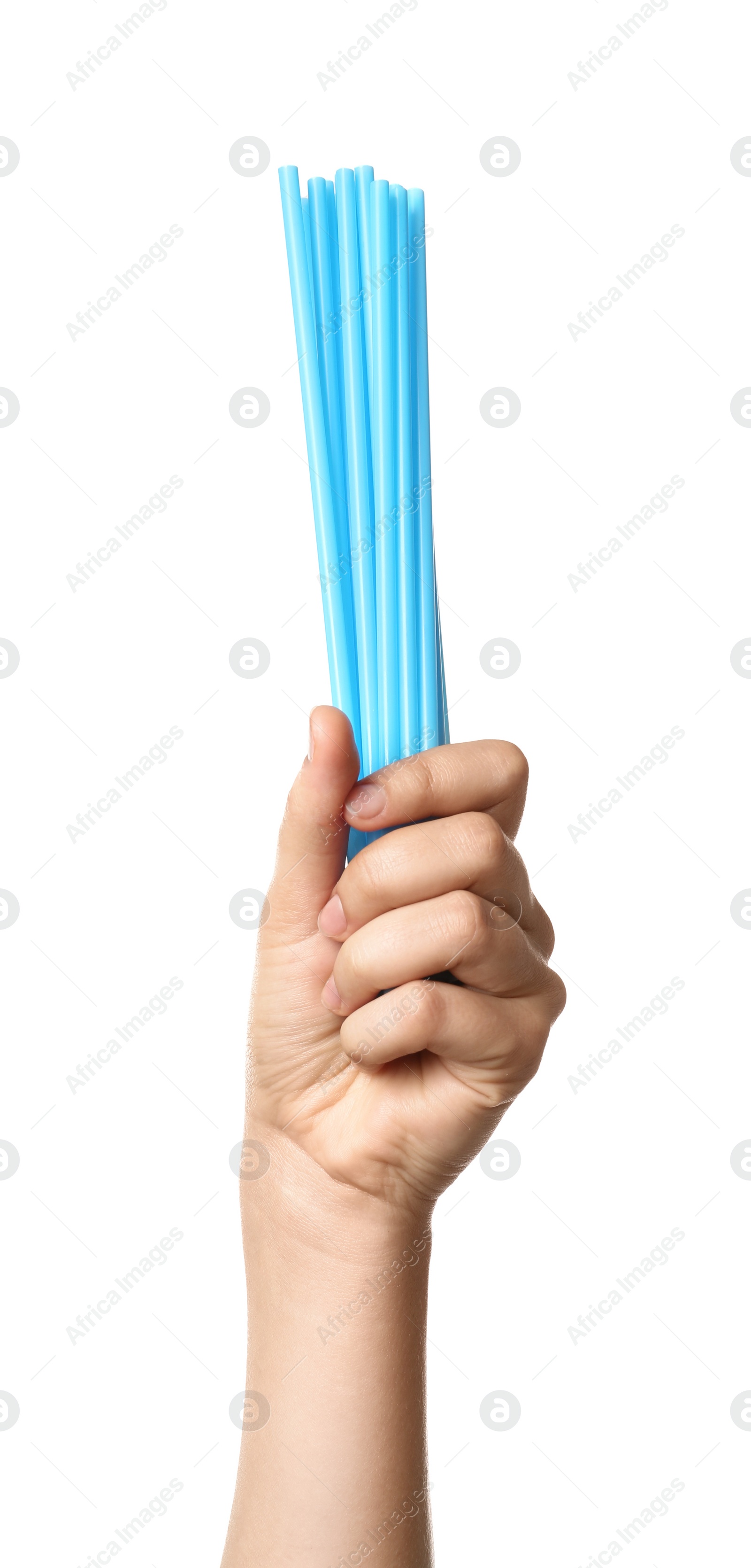 Photo of Woman holding bunch of plastic straws on white background, closeup