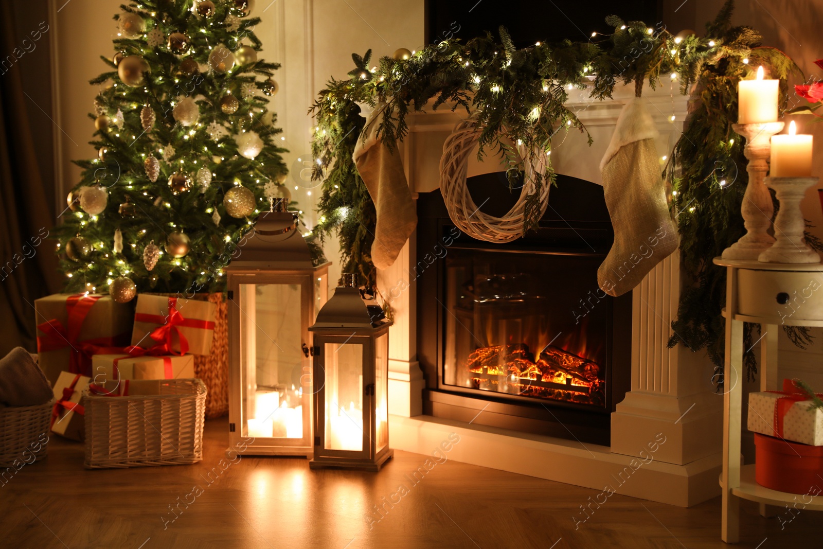 Photo of Beautiful room interior with fireplace and Christmas decor in evening