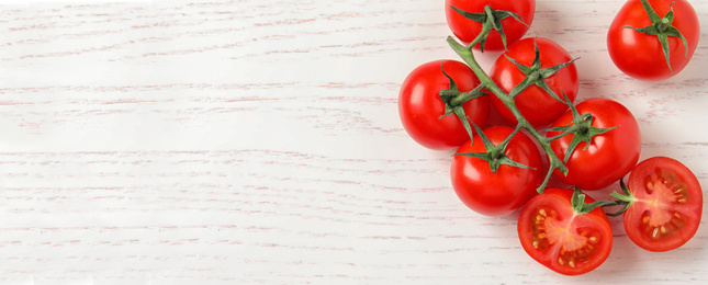 Image of Flat lay composition with fresh cherry tomatoes on white wooden table, space for text. Banner design 