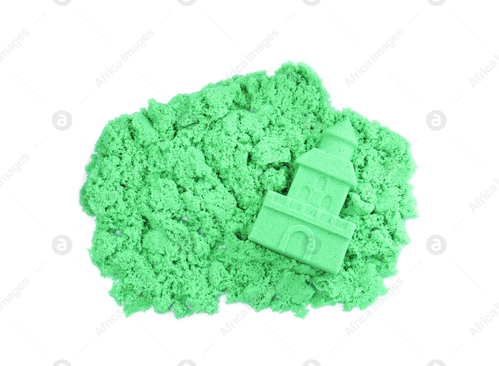 Photo of Castle made of kinetic sand on white background, top view