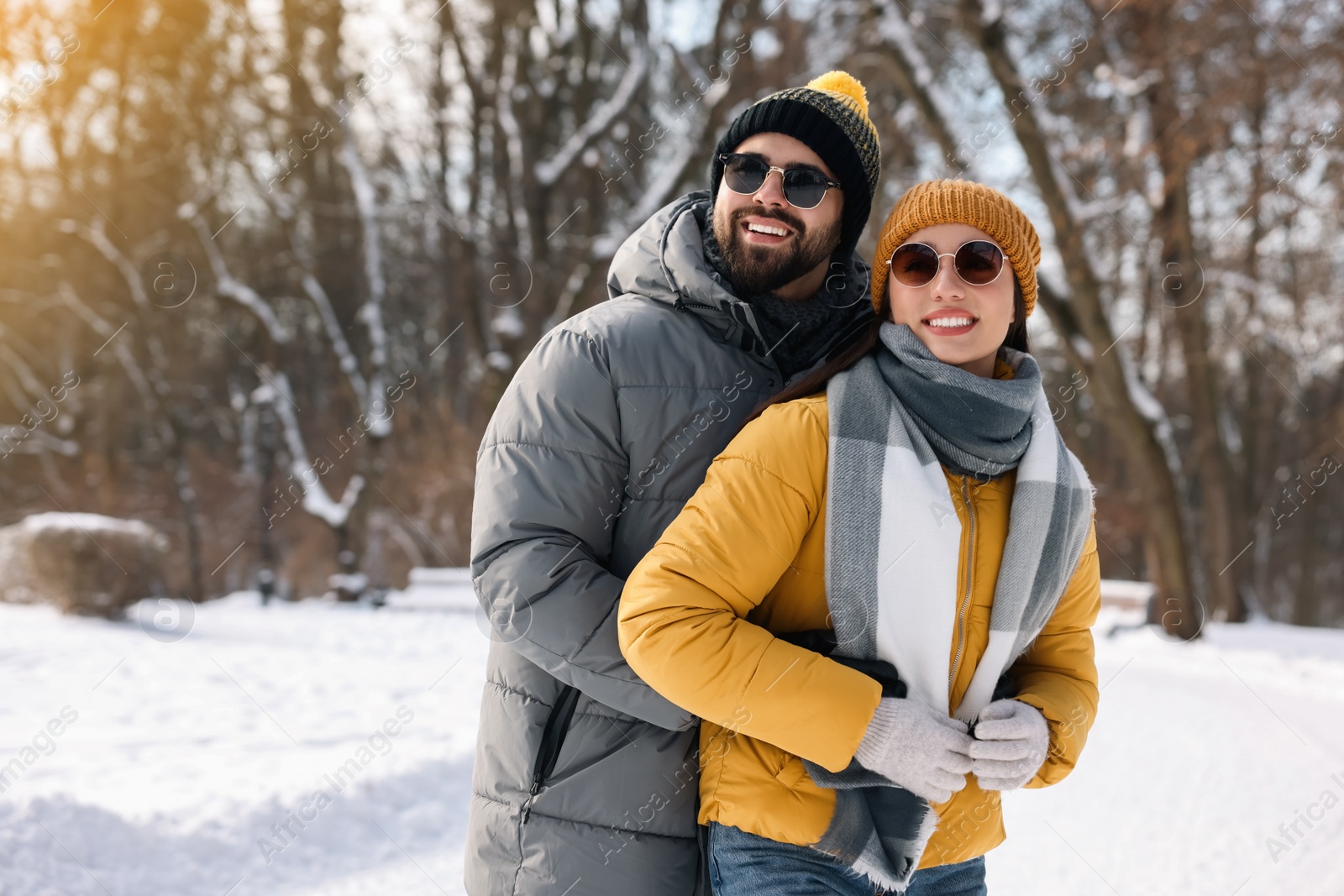 Photo of Beautiful happy couple spending time together on winter day