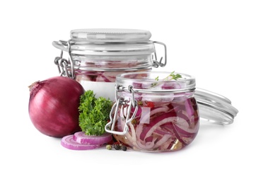 Photo of Jars of pickled onions isolated on white