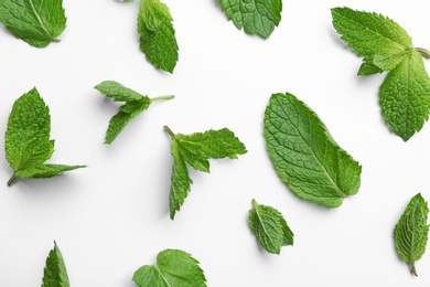 Photo of Fresh mint leaves on white background, flat lay