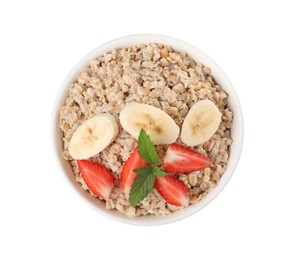 Photo of Tasty boiled oatmeal with strawberry and banana in bowl isolated on white, top view