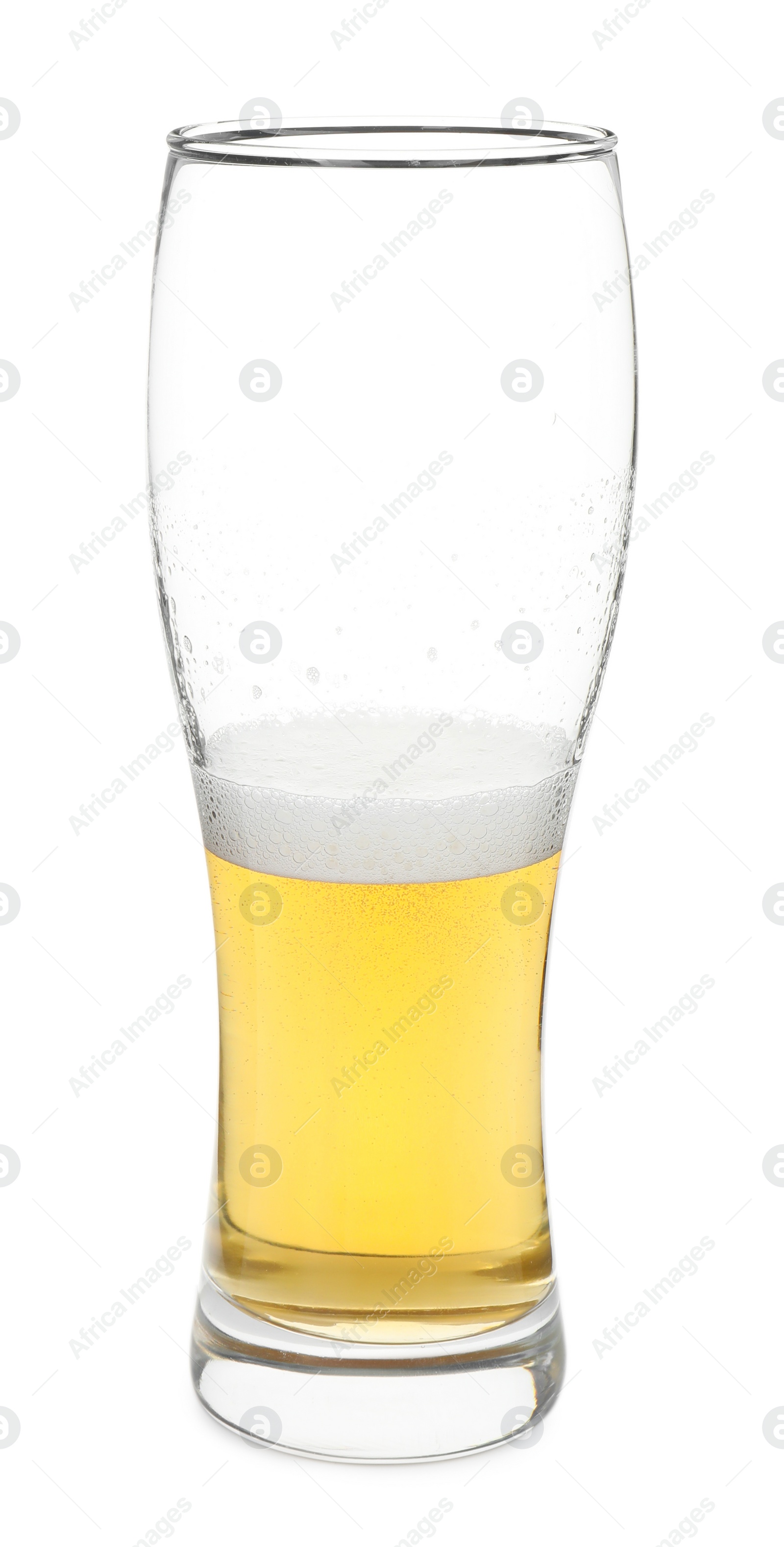 Photo of Half full glass of beer isolated on white