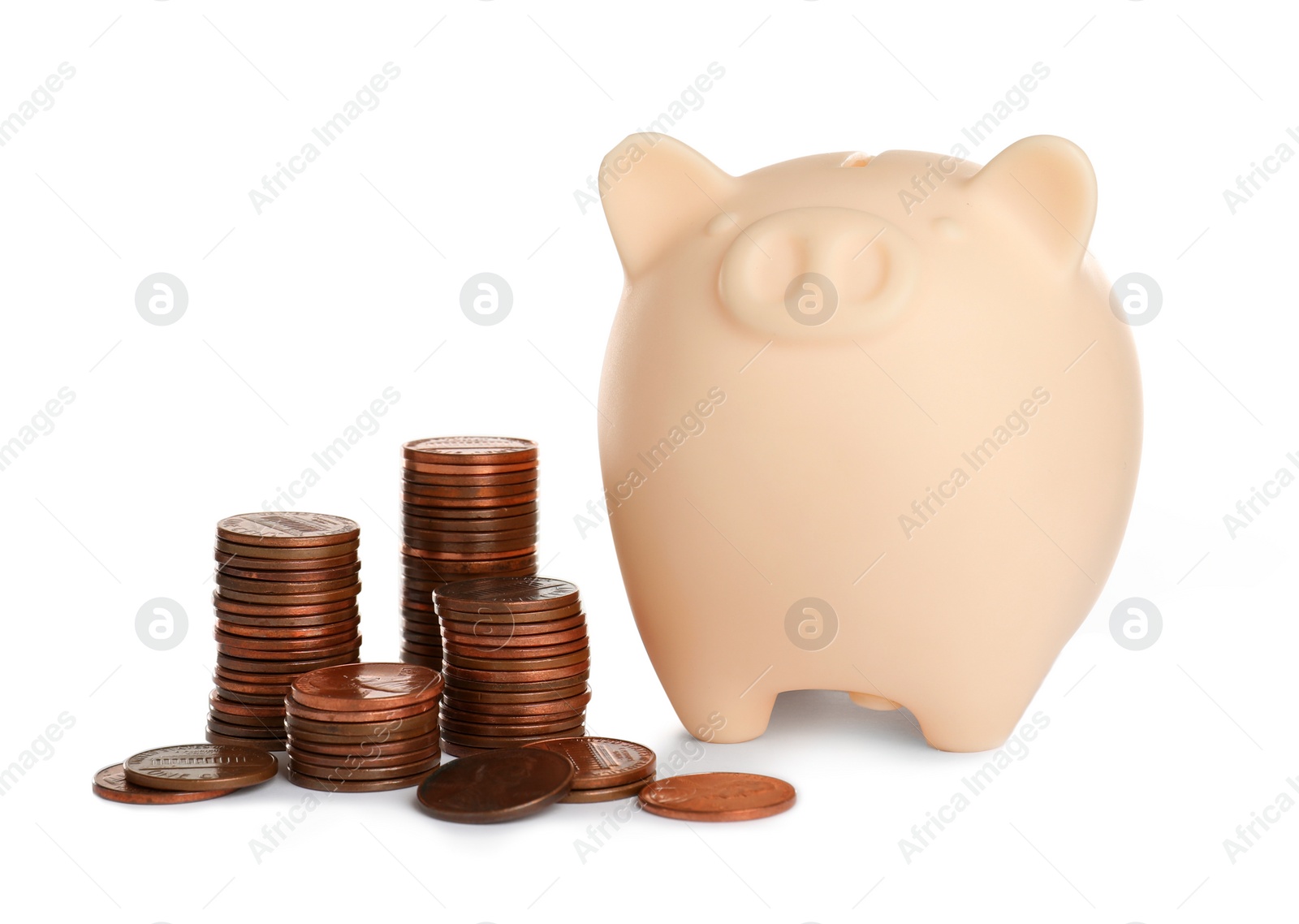 Photo of Piggy bank and different height coin stacks on white background