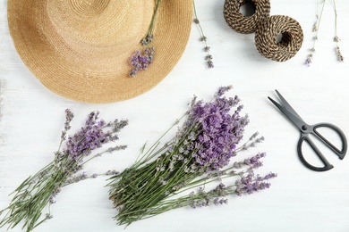 Photo of Flat lay composition with lavender flowers on light background