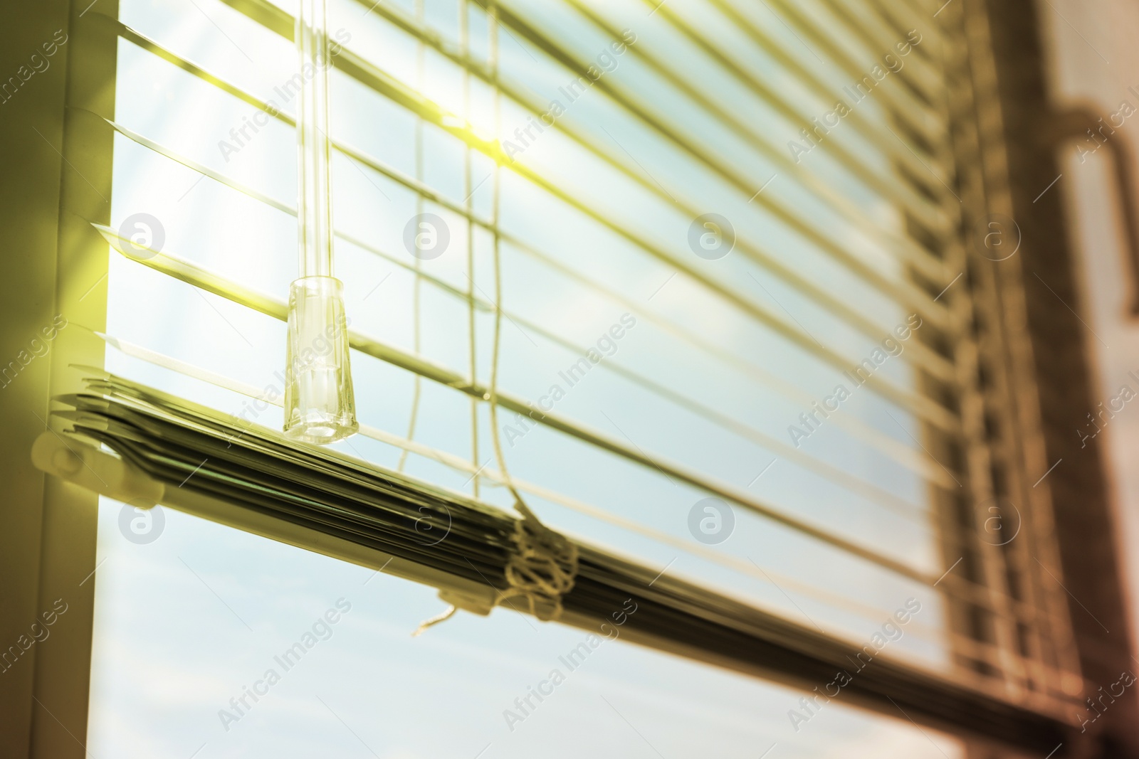 Image of Stylish window with horizontal blinds indoors, closeup