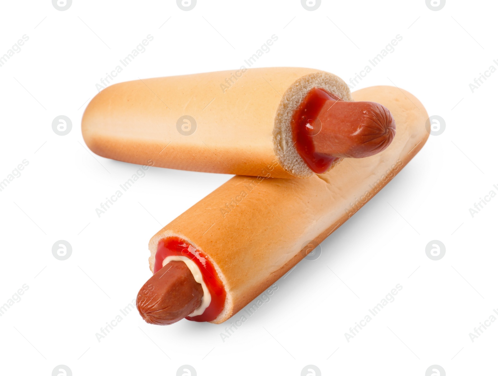 Photo of Tasty french hot dogs with sauce isolated on white