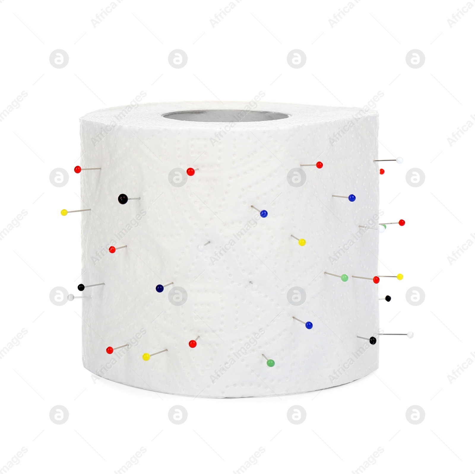 Photo of Roll of toilet paper with straight pins isolated on white. Hemorrhoid problems