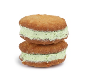 Photo of Sweet delicious ice cream cookie sandwiches on white background