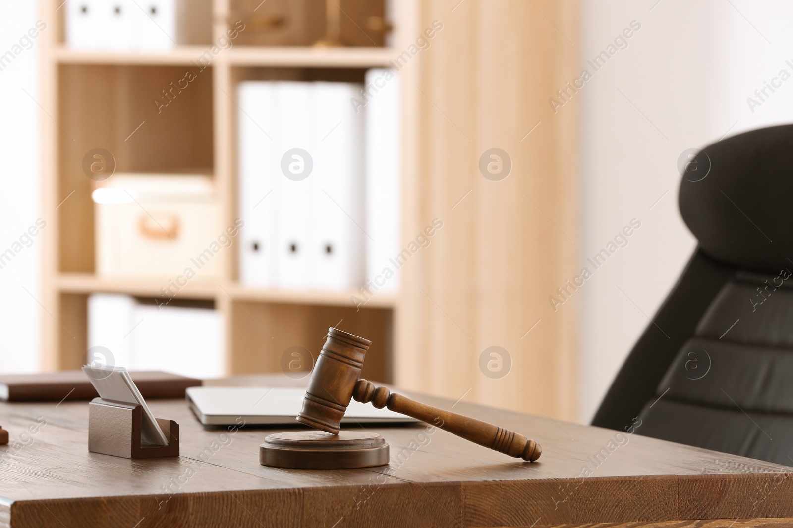 Photo of Table with judge gavel in lawyer's office