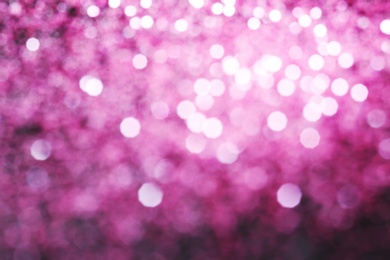 Photo of Bright magic pink bokeh effect as background
