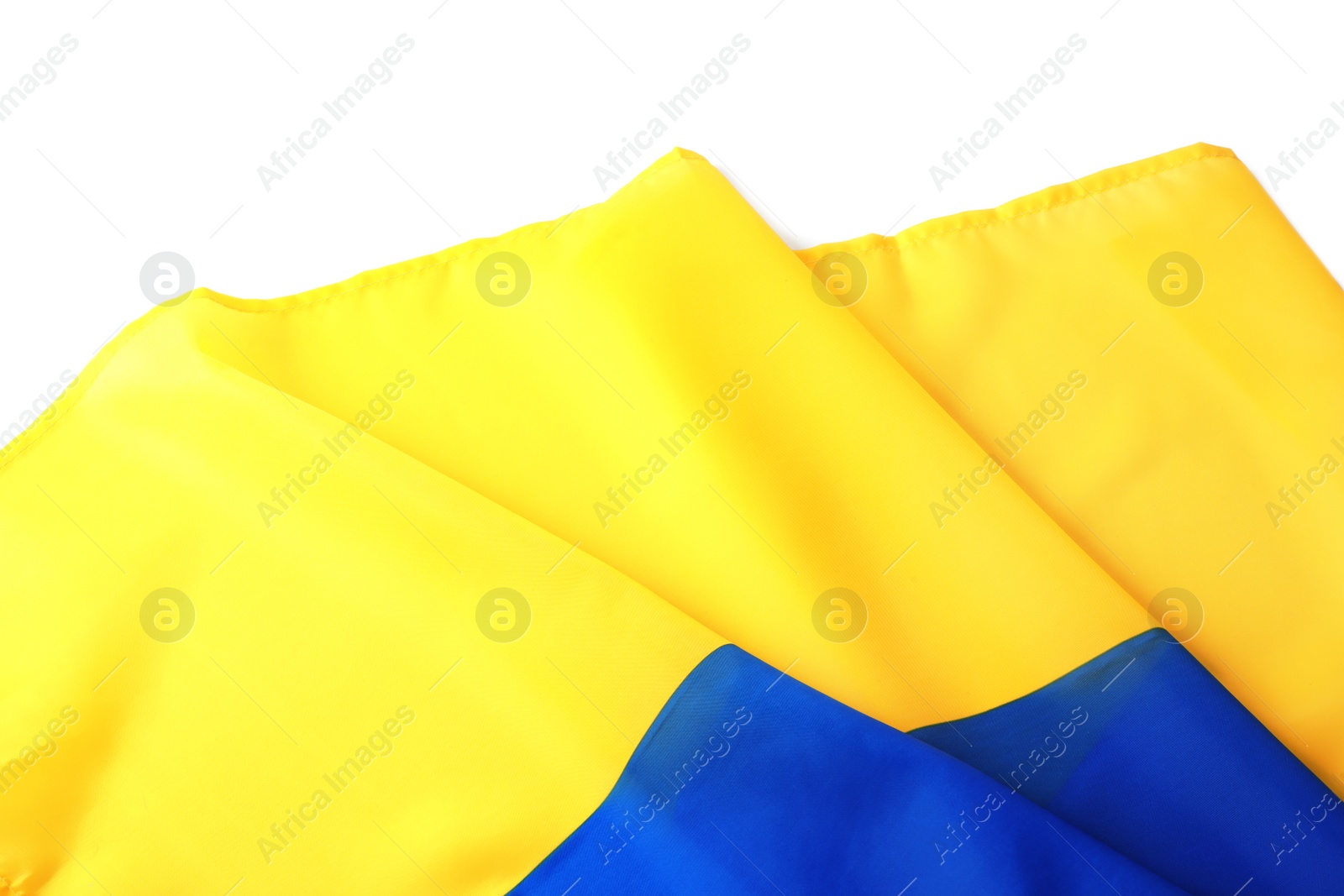 Photo of National flag of Ukraine on white background, closeup