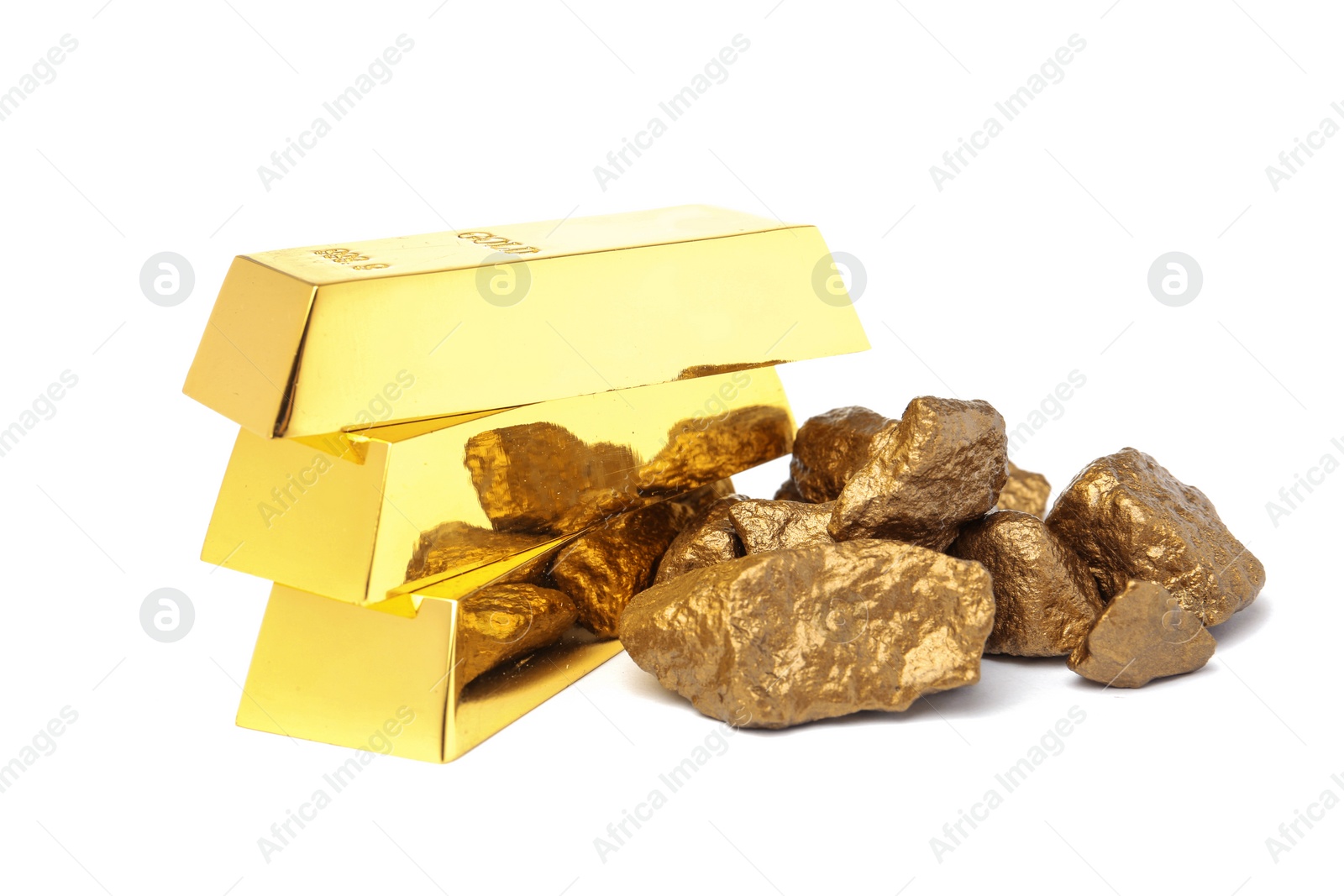 Photo of Gold nuggets and ingots on white background