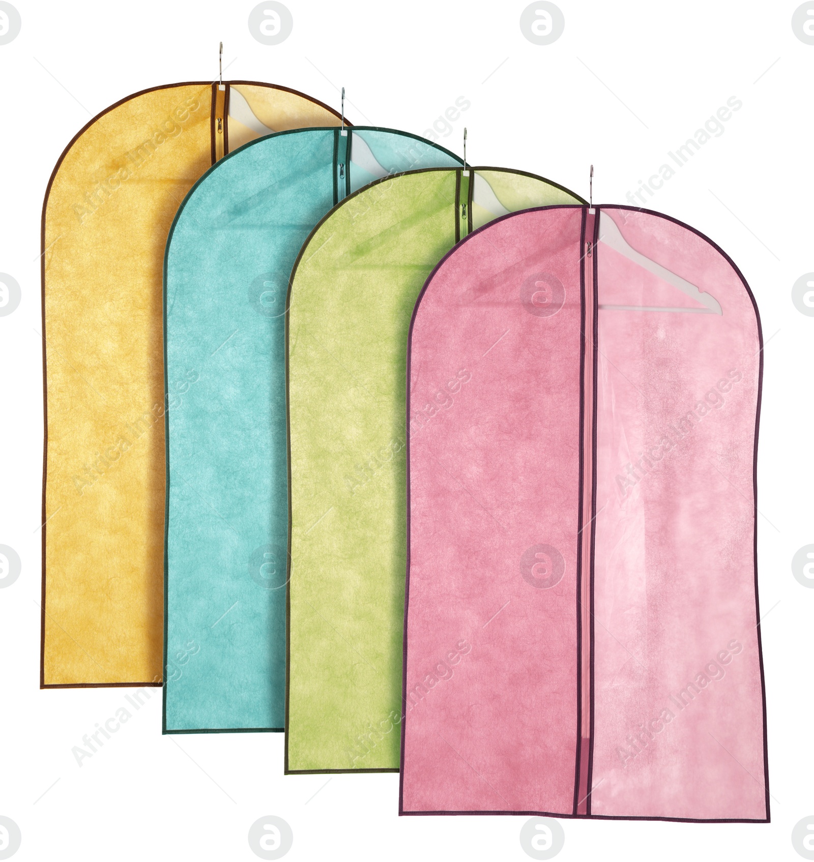 Image of Set with different garment bags for clothes on white background 