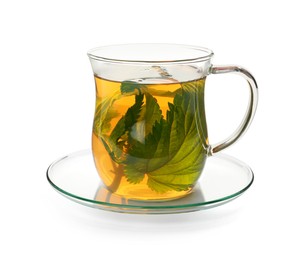 Photo of Glass cup of aromatic nettle tea on white background