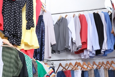 Photo of Modern dressing room with different stylish clothes