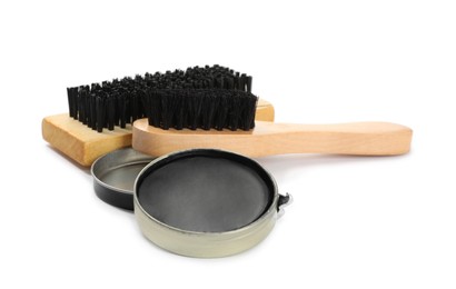 Photo of Shoe care accessories on white background. Footwear clean items