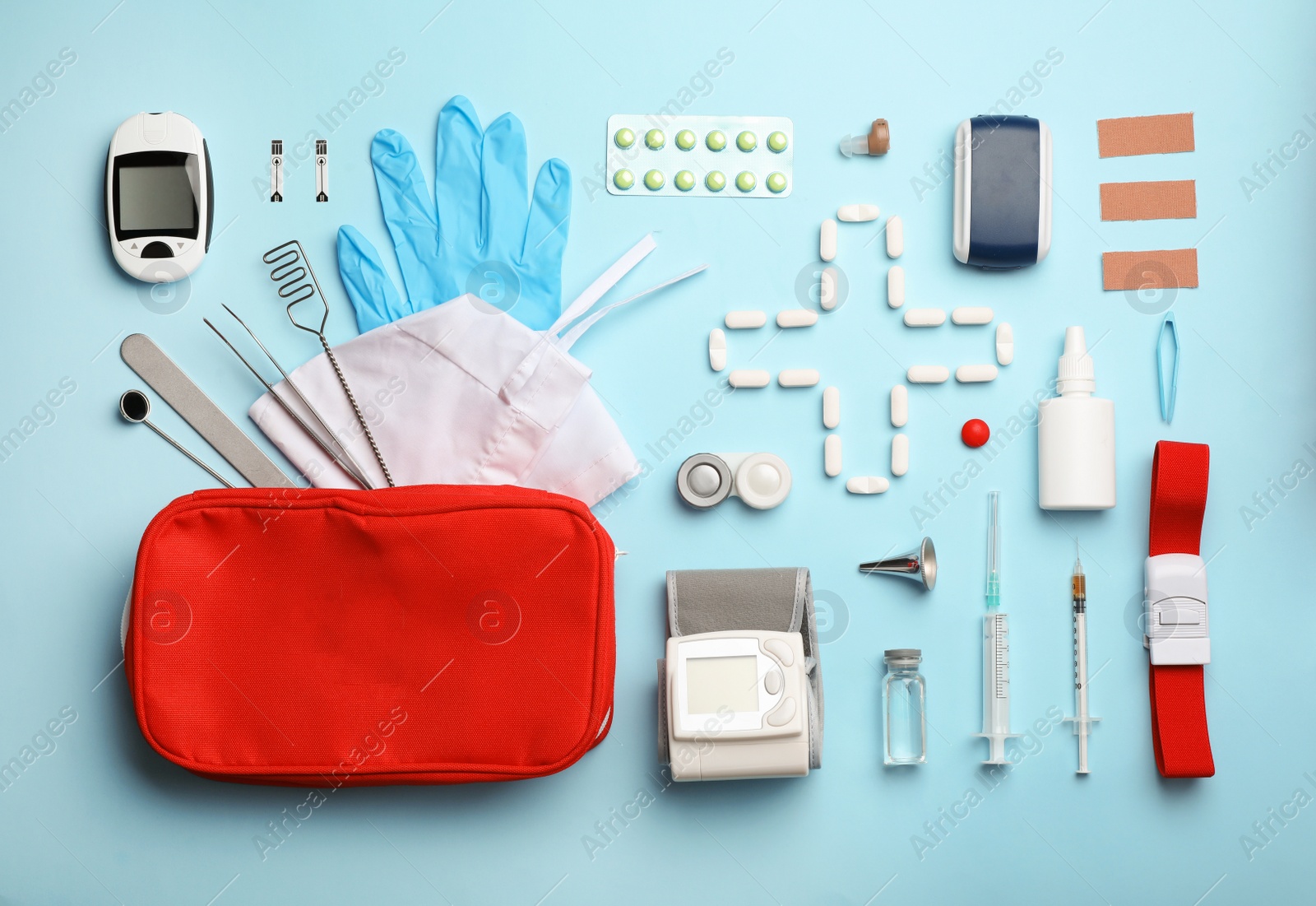 Photo of Flat lay composition with medical objects on color background