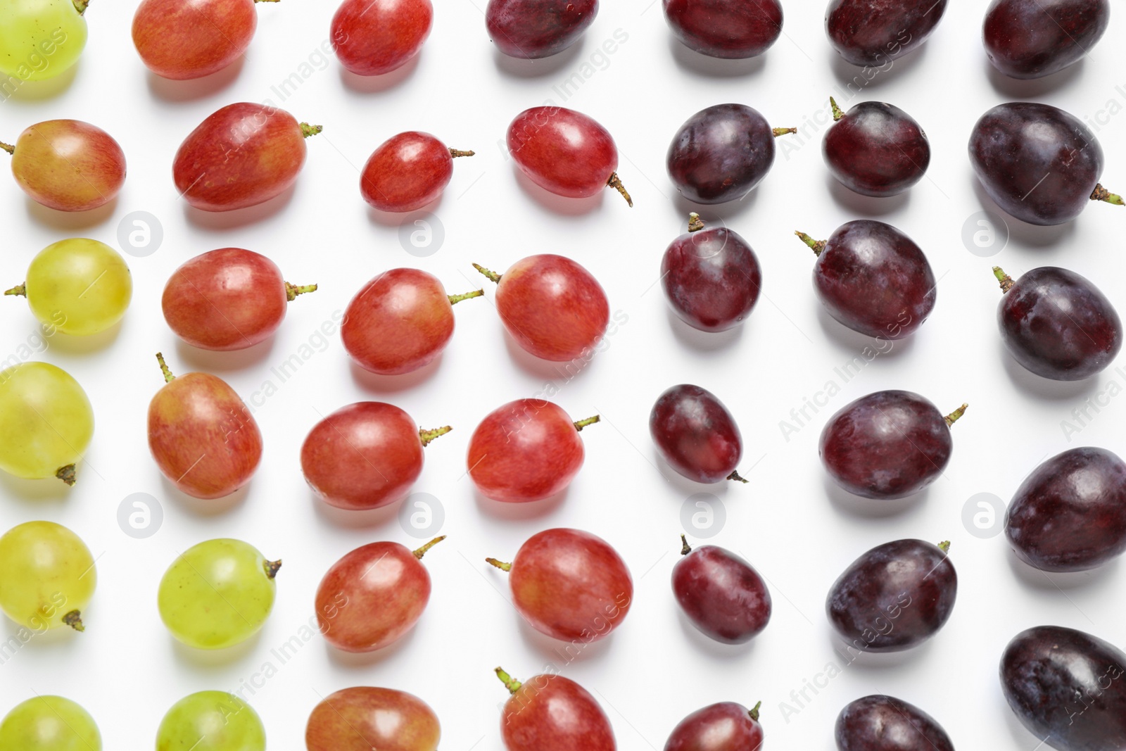 Photo of Fresh ripe juicy grapes on white background, top view