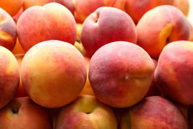 Photo of Fresh ripe peaches as background, closeup view