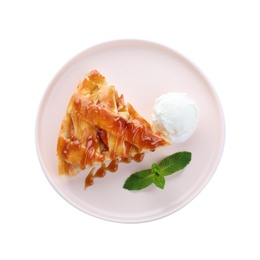 Photo of Slice of traditional apple pie with ice cream and mint isolated on white, top view