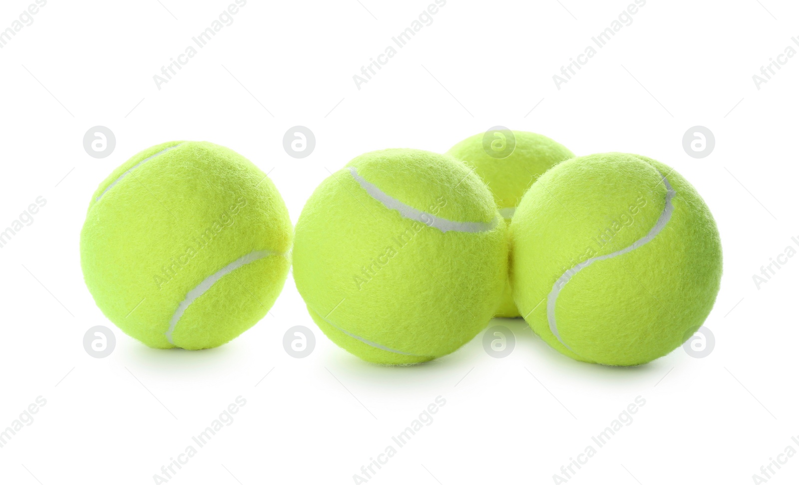 Photo of Tennis balls isolated on white. Sports equipment