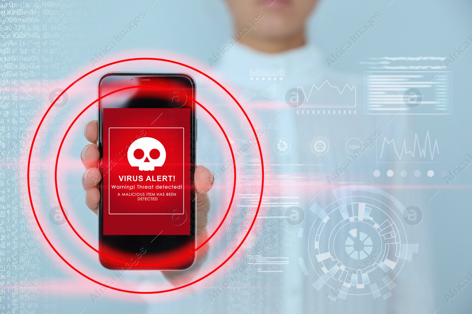 Image of Woman holding smartphone with warning about virus attack on display, closeup