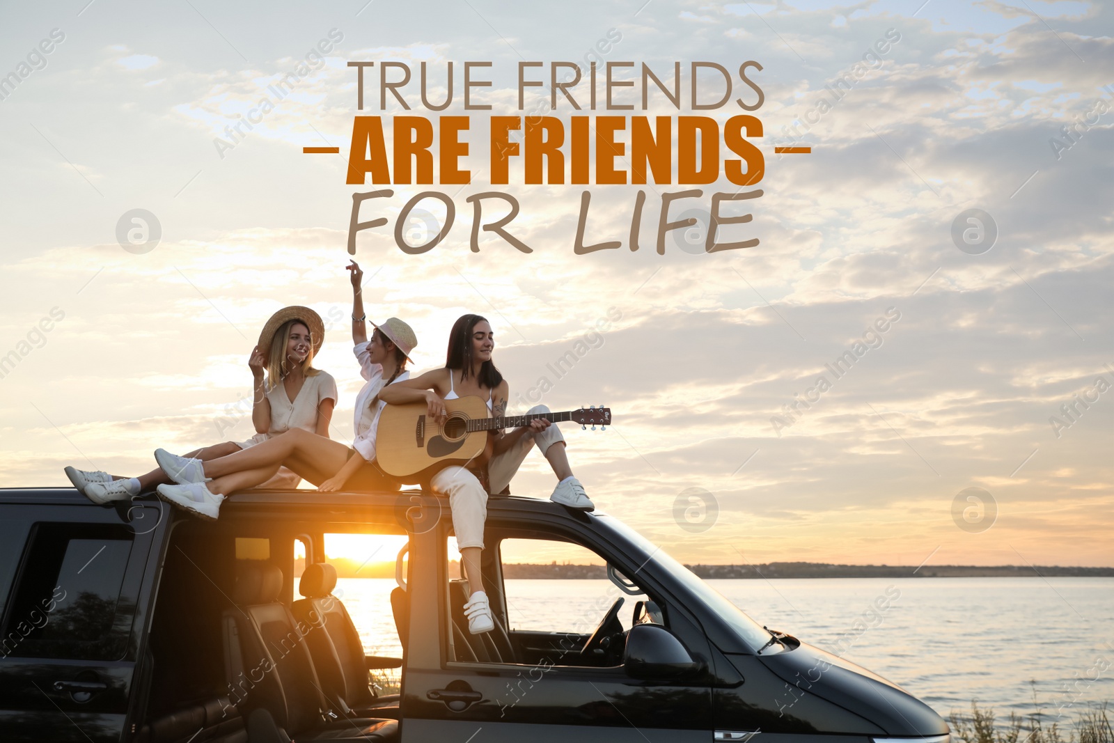 Image of True Friends Are Friends For Life. Inspirational quote saying that truly friendship lasts for years. Text against view of girls having fun on car roof at sunset