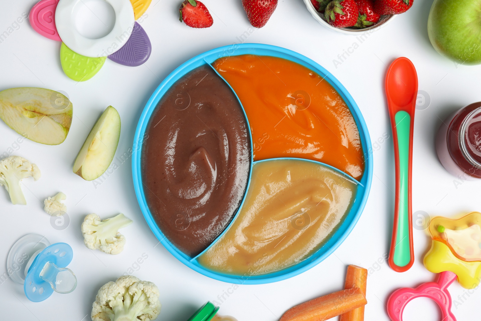 Photo of Flat lay composition with baby food, ingredients and accessories on white background