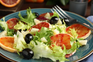 Photo of Plate of delicious sicilian orange salad, closeup