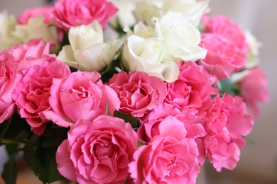 Beautiful bouquet of roses on blurred background, closeup