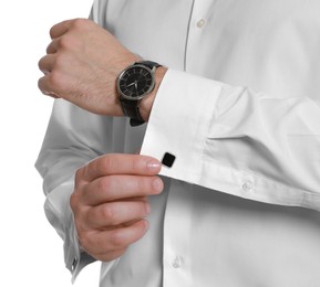 Photo of Man wearing stylish shirt and cufflinks on white background, closeup