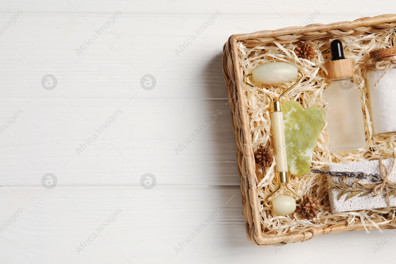 Photo of Spa gift set with different personal care products on white wooden table, top view. Space for text