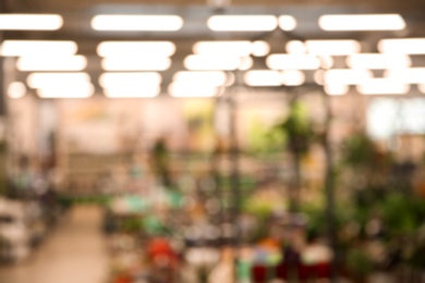 Blurred view of modern shopping mall interior