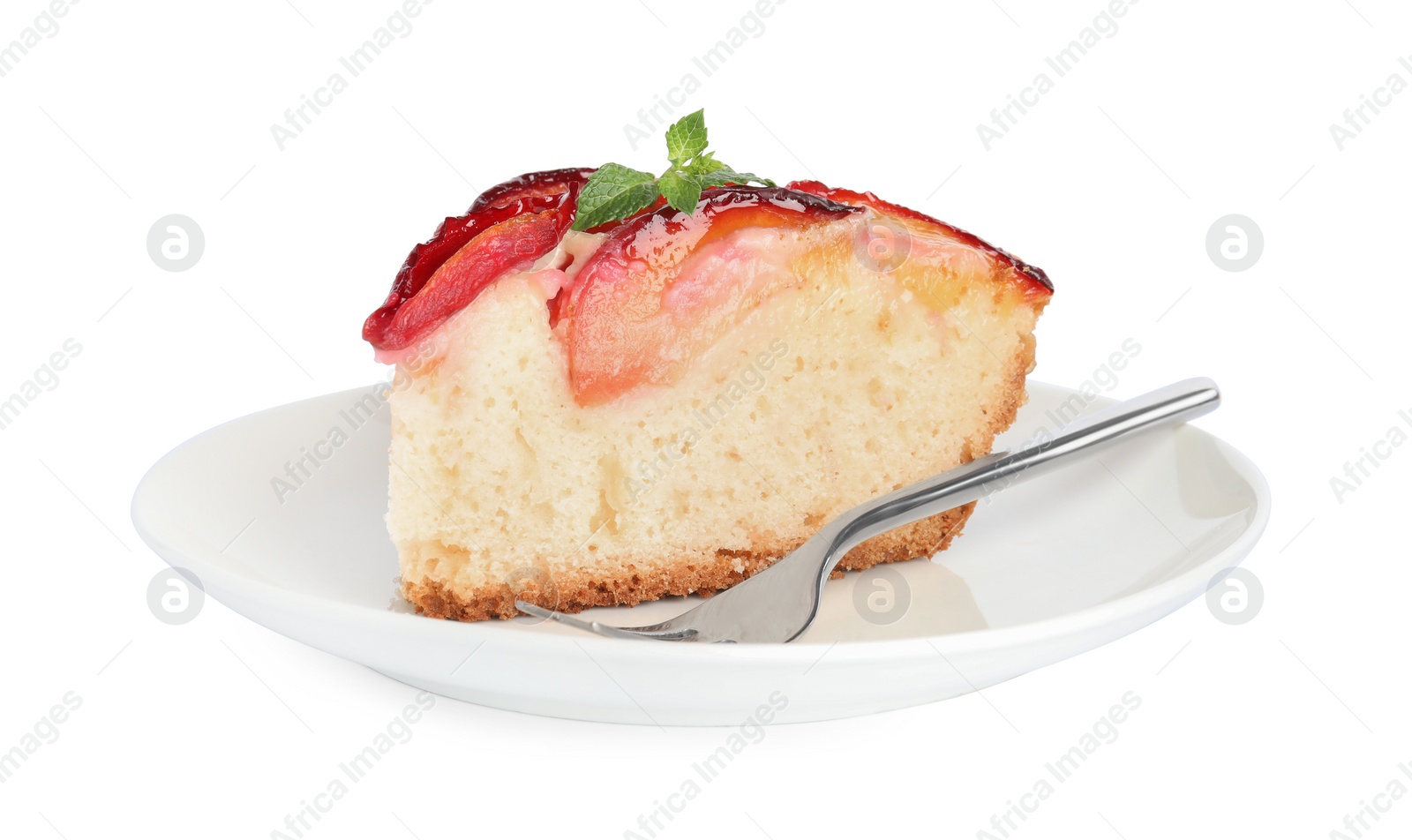 Photo of Slice of delicious cake with plums isolated on white