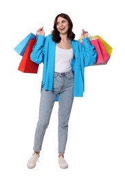 Photo of Beautiful young woman with paper shopping bags on white background