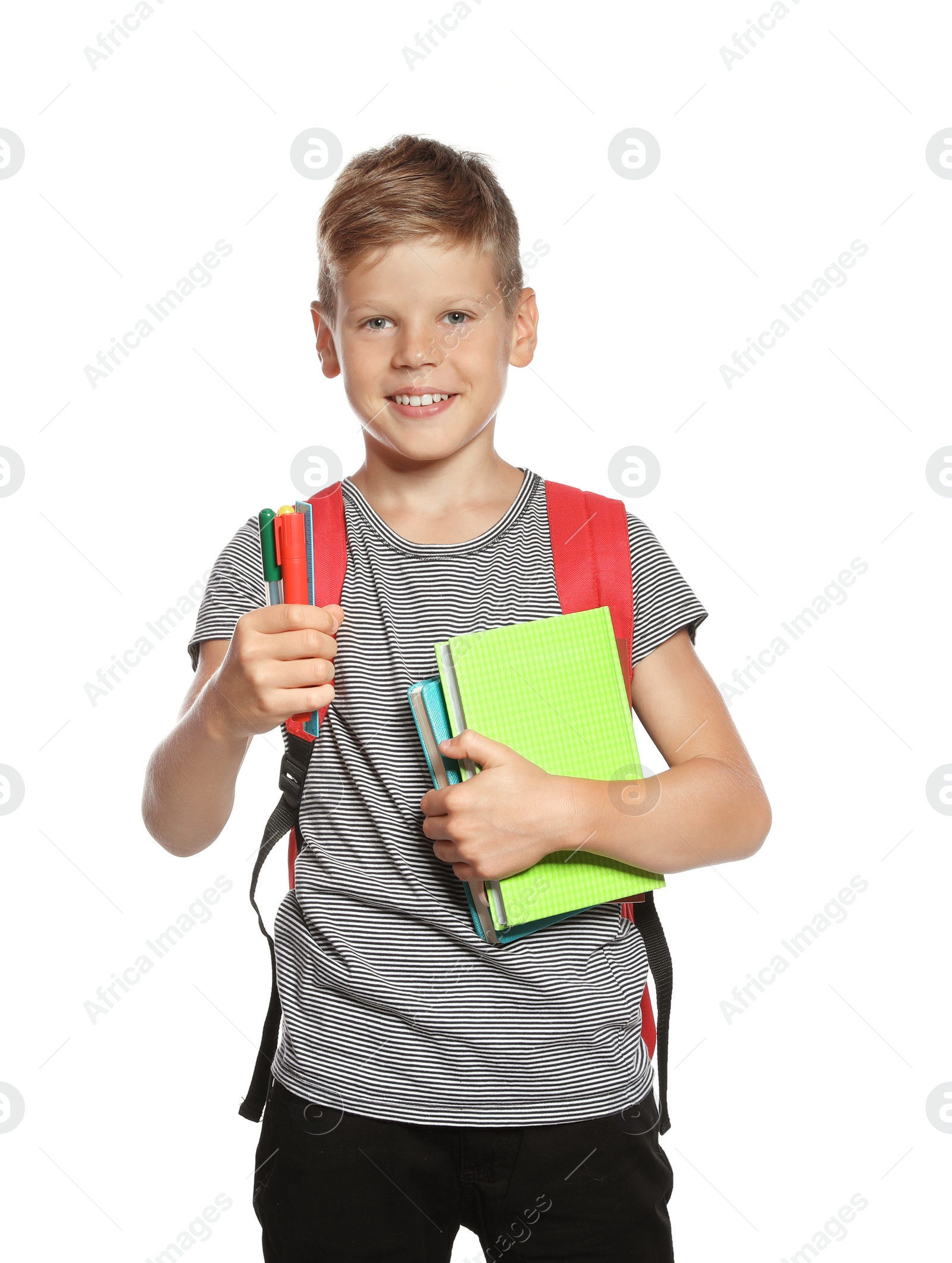 Photo of Cute boy with school stationery on white background