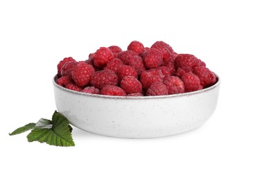 Photo of Bowl of fresh ripe raspberries with green leaves isolated on white