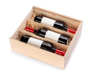 Photo of Wooden gift box with wine bottles isolated on white