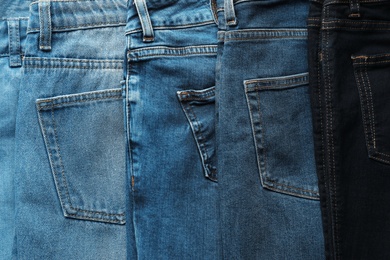 Photo of Jeans of different colors as background