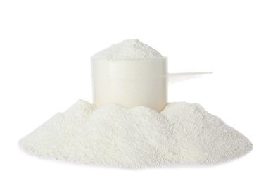 Photo of Scoop and pile of protein powder isolated on white