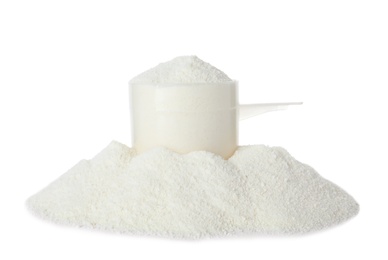 Scoop and pile of protein powder isolated on white