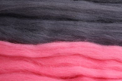 Photo of Colorful felting wool as background, closeup view