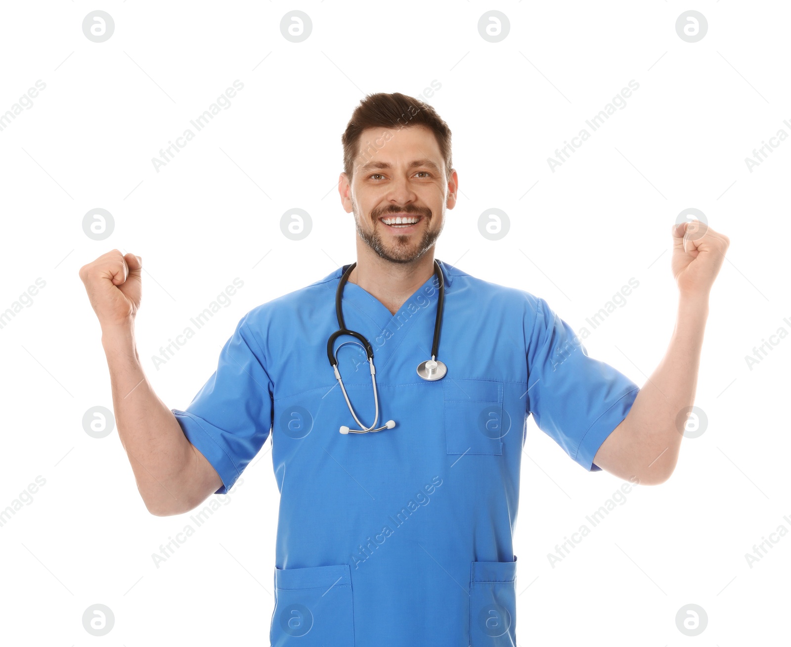 Photo of Portrait of smiling male doctor in scrubs isolated on white. Medical staff