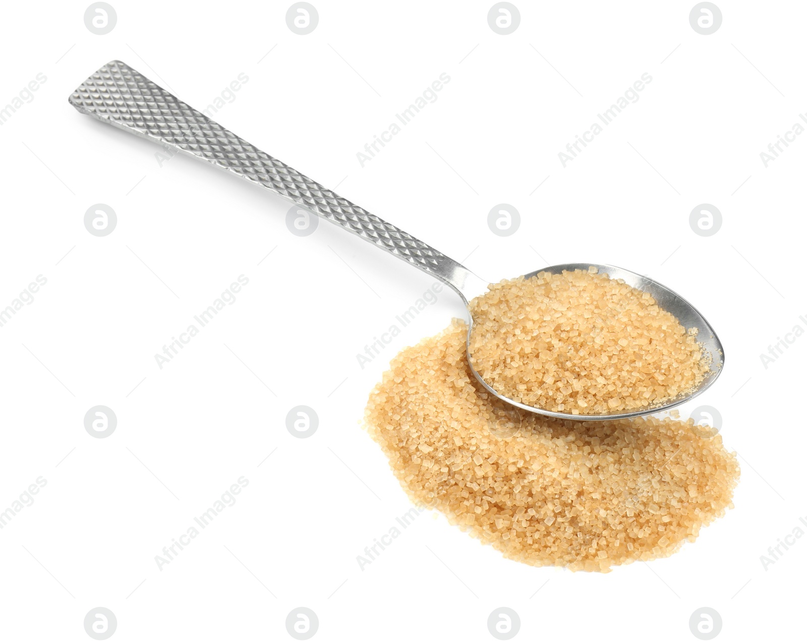 Photo of Pile of brown sugar and spoon isolated on white