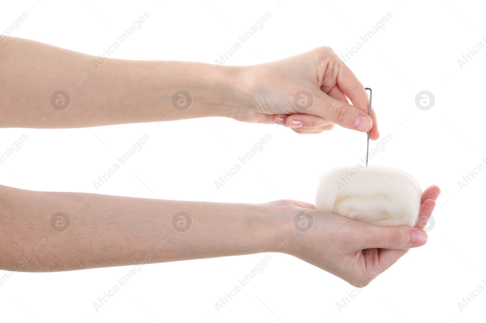 Photo of Woman needle felting from wool on white background, closeup